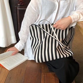 Resim Kadınlar için büyük kapasiteli, desenli, şık bir omuz çantası, kapanmayan tasarıma sahip, unlined, kampüs, seyahat ve alışveriş için çok yönlü 
