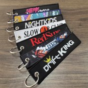 Resim 1 adet JDM Slogan Anahtarlık, Çift Taraflı Nakış, Naylon, Kaplamasız Değerli Metal, Örgüsüz, Kumaş Malzeme, Araba, Motosiklet için, Evrensel Uygulanabilir 