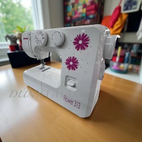 Resim Dünya Makina Janome Flower 313 Taşınabilir Dikiş Makinesi - 13 Dikiş Programı, Hafif ve Sessiz Tasarım 