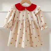 Resim Kızın rahat ve şık kiraz desenli uzun kollu elbise, sonbahar ve ilkbahar dış mekanlar için uygun 