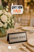 Resim Happynesso Masa Yazısı Serisinden SİYAH Pleksi Üstü Çift Yön SILVER Metal “DAMAT AİLESİ” Yazısı - 10 cm x 5 cm 
