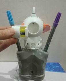 Resim Empressco Turuncu astronot tasarımlı masa lambası, kalemlik ve traş seti, şık ve fonksiyonel ürün. 