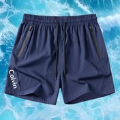 Resim Erkekler için Hızlı Kuruyan Hafif Plaj Şortu - Ayarlanabilir Elastik Bel, Bol Kesim, Nefes Alabilen Polyester/Elastan Karışımı, Fermuarlı Cepli ve CALVIN Yazılı Baskı ile Yüzme, Koşu, Yürüyüş, Yazlık Dış Aktiviteler İçin 