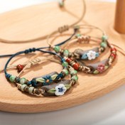 Resim Kadınlar için el yapımı seramik çiçekli halat bilezik - Sevimli kabile tarzı, ayarlanabilir kaplama olmayan, günlük ve hediye fırsatı, Sevgililer Günü için mükemmel, tüm mevsimler için çok yönlü 