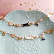 Resim 1 adet Anneler Günü Sevimli 'S Moda Bileklik - Pastel Pembe ve Beyaz Şanslı Kedi, Kurdele ve Yıldız Detayları, Günlük Giyim, Partiler ve Tatil Hediyeleri için Alaşım Takı, Parti Aksesuarı, Şirin Şanslı, Dayanıklı Bileklik 