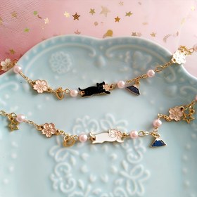 Resim 1 adet Anneler Günü Sevimli 'S Moda Bileklik - Pastel Pembe ve Beyaz Şanslı Kedi, Kurdele ve Yıldız Detayları, Günlük Giyim, Partiler ve Tatil Hediyeleri için Alaşım Takı, Parti Aksesuarı, Şirin Şanslı, Dayanıklı Bileklik 