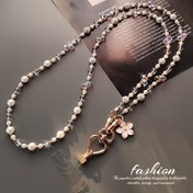 Resim Şık İnci & Kristal Telefon Askısı Altın Kalp Charm ile - Kadınlar için Şık Kayıp Önleyici Telefon Kayışı, Dış Mekan Seyahati ve Günlük Kullanım için Dayanıklı Crossbody Aksesuar, İnci Boncuk Tasarımı 