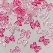 Resim 100 adet Kelebek Nail Art Sihirleri, Şeffaf ve Pembe Rengi Desen, Kokusuz Manikür Dekoru için DIY Tırnak Sanatı 