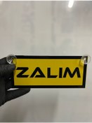 Resim Sarı Renk Üzeri Siyah Renk Zalım Yazılı Vantuzlu Cam Süsü 