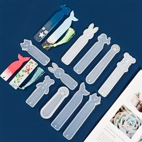 Resim 1 adet Silikon Hayvan Şekilli Yer İşareti Kalıbı, Takı El Yapımı Sanat ve El Sanatları Yapımı için Püsküllü Kolye Düğmeleri ile DIY Epoksi Reçine Döküm Aracı 