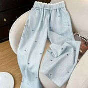 Resim Kadınlar İçin Bej Geniş Paça Pantolon - Dikey Çizgili Uzun Beyaz Kenarlık Detaylı, Kemerli Bel Tasarımı, Şık Çalışma ve Resmi Etkinlikler için, 4 Mevsim Makinede Yıkanabilir (Orta Doğu Esintili) 