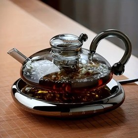 Resim Bir Yüksek Borosilikat Cam Çaydanası, Isıya Dayanıklı ve Kaynatma Suyu İçin Uygun, Alevler ve Elektrikli Ocaklarda Çay Pişirmek İçin Mükemmel. 10 Büyük Bayramda (Noel, Cadılar Bayramı, Sevgililer Günü vb.) Çay Severler İçin Şık Bir Hediye. 