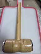 Resim İnova Ahşap saplı et döveceği. 