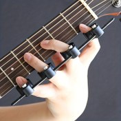 Resim 1 adet Siyah Gitar ve Piyano Parmak Güçlendirici - Gelişmiş Beceri ve Esneklik için Ayarlanabilir ABS Parmak Aralayıcı - Beceri Geliştirme ve Yorgunluk Azaltma için Evrensel Müzik Enstrümanı Aksesuarı 