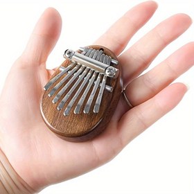 Resim Zarif 8 tuşlu Mini Kalimba, Mükemmel ve Taşınabilir Parmak Piyano, Tüm Özel Günler İçin Doğum Günü ve Tatil Hediyeleri, Yüksek Kaliteli ve Çok Yönlü Müzik Aksesuarı 