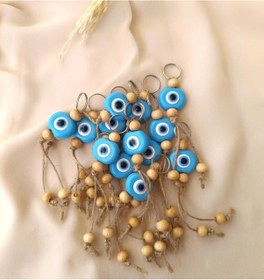 Resim Nazar Boncuk Anahtarlık Mavi 10 Adet Kötü Göz Kovucu Ahşap Boncuklu Nazar Hand Made Hasır Nazarlı Anahtarlık 