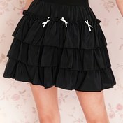 Resim Kızlar için bir püsküllü etek, 7-14 yaş arası kızlar için uygun, ilkbahar ve yazda her gün dış mekan oyunları için mükemmel. 