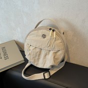 Resim Ayarlanabilir Askılı, Büyük Kapasiteli, Hafif, Günlük Kullanıma Uygun, Fermuarlı, Polyester Astarlı Şık Bej Naylon Yuvarlak Çapraz Vücut Çantası - Günlük Kullanıma ve Rahat Çapraz Vücut Çantası İçin Mükemmel 