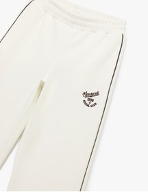 Resim Koton Pamuklu Şardonlu Biyeli Baskılı Beli Lastikli Geniş Paça Eşofman Altı Ekru 6wal40045ık Ekru 