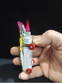 Resim enyatakı Kaykay modeli ızgaralı pürmüzlü alevli tamamı metal kaplama kaliteli tarz çakmak 