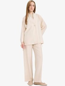 Resim DeFacto Wide Leg Beli Lastikli Krinkıl Kumaş Geniş Paça Pantolon 