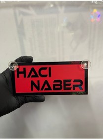 Resim Kırmızı Renk Üzeri Siyah Renk Hacı Naber Yazılı Vantuzlu Cam Süsü 