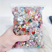 Resim Çeşitli şekillerde, kalp ve kurdele şekilleri de dahil olmak üzere, reçineden yapılmış, düz tabanlı tırnak sanatı taşları için 50 gram (1500-2000 adet) 3D karışık renkli tırnak süslemeleri. 