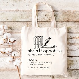 Resim Preppy Tarzı Büyük Kanvas Kitap Aşıkları İçin Tote Çanta - Abibliophobia Kitap Tasarımı, Kitap Yığını ve Tanım Baskılı, Dayanıklı Solmaya Karşı Dirençli Yeniden Kullanılabilir Çok Amaçlı Omuz Çantası - Alışveriş, Depolama, Seyahat İçin - Okuyucular ve Kitap Tutkunları İçin Mükemmel Hediye (Beyaz) 