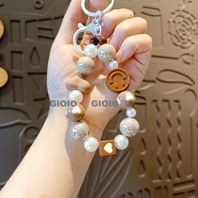 Resim Silver1 Gıoıo Yeni Loopy Çizgi Film Anahtarlık Sevimli Kunduz Arı Bebek Kadın Çanta Kolye Araba Anahtarlık Aksesuarları (Yurt Dışından) 