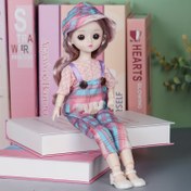 Resim 29Cm/11.4İnç Şık Bebek, Çıkarılabilir Giysilerle, Bir Yatak Odasını Veya Bebek Evi Dekore Etmek İçin Mükemmel, Çocuklar İçin Harika Bir Doğum Günü Hediyesi, Güzel Büyük Gözlere Ve Sevimli Bir Figüre Sahip. 