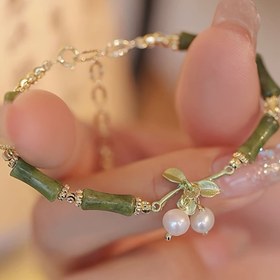 Resim Yeni Çin bambu çan bileklik kadın niş retro peridot bayan rüzgar çanı bileklik 