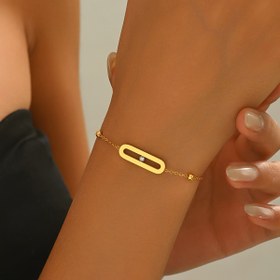 Resim Şık ve zarif bir geometrik paslanmaz çelik bilezik, altın kaplama ile süslenmiş, sentetik zirkon ile süslenmiş, moda ve çok yönlü kadın takıları için mükemmel. 