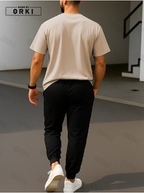 Resim EFFRENATU Dünyayı Fethet Baskılı Oversize Bej Tişört & Siyah Pantolon Eşofman Takımı 
