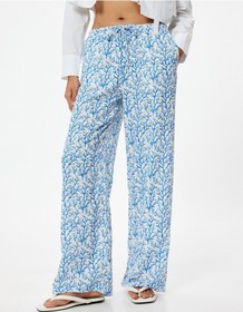 Resim Koton Bol Paça Pantolon Yüksek Bel Bağlama Detaylı Floral Desenli Rahat Kalıp Mavi Desenli 4sak40219ew Mavi 
