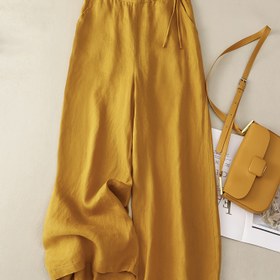 Resim Kadınların Şık Hardal Sarısı Geniş Paça Pantolonu - Yüksek Bel, Bol Kesim, Düğme Detayı, Esnemez Kumaş, İlkbahar ve Yazlık Günlük Giyim için Mükemmel, Rahat Moda | Düğme Detaylı Pantolon | Püskül Etek Tasarımı 