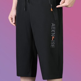 Resim Erkekler için Drawstring ve Fermuarlı Cep Detaylı Yedi Noktalı Spor Pantolonu, Basit ve Şık, Spor, Fitness ve Günlük Kullanım için Uygun 
