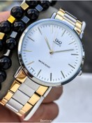 Resim Q&Q Erkek Kol Saati, Gümüş-Sarı Çelik Kordon, 5 ATM Su Geçirmez, Bileklik Hediyeli 