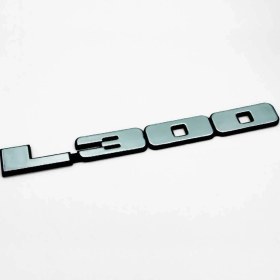 Resim Mıtsubıshı L300 Uyumlu Yazı (Amblem) En:23,5cm Yükseklik:2,9cm MB154465 