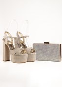 Resim E&L Company Net 16cm Altın simli kumaş light gold. Çantasıyla birlikte takımdır. 