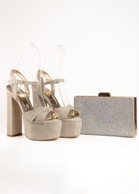 Resim E&L Company Net 16cm Altın simli kumaş light gold. Çantasıyla birlikte takımdır. 
