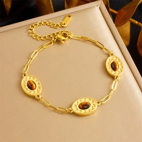 Resim Kadınlar için günlük kıyafet ve partiler için şık aksesuar olan, oval kahverengi sentetik zirkonyum kolyeler taşıyan, şık vintage desenli ve parlatılmış altın paslanmaz çelik bilezik 